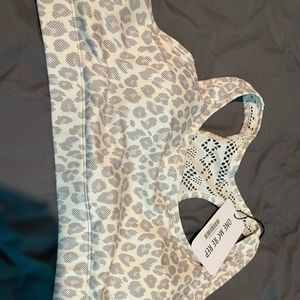 Brand new Zyia Ivory leopard bomber sports bra
